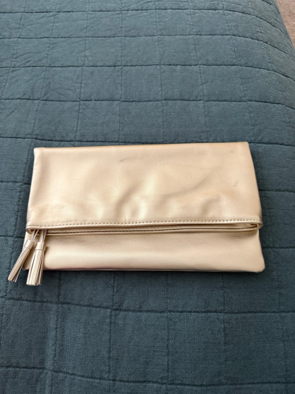 Monat Gold Fold-Over Clutch with Tassel Detail
